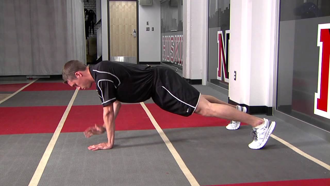 Planks with Shoulder Taps
